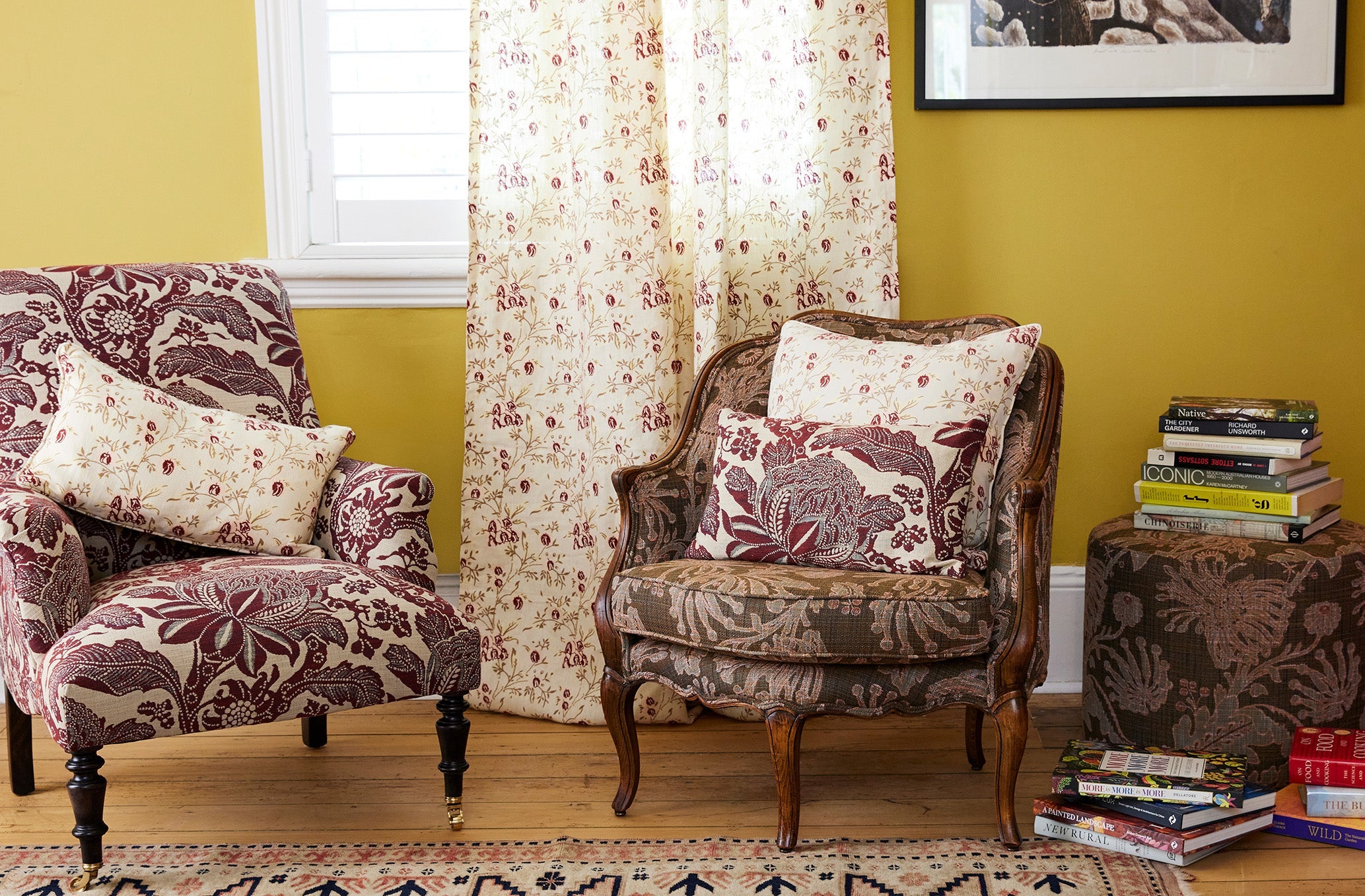 Utopia Goods Antique French Bergere Armchair - Firewheel Rust Performance Fabric: burgundy floral upholstered chair in sunny room