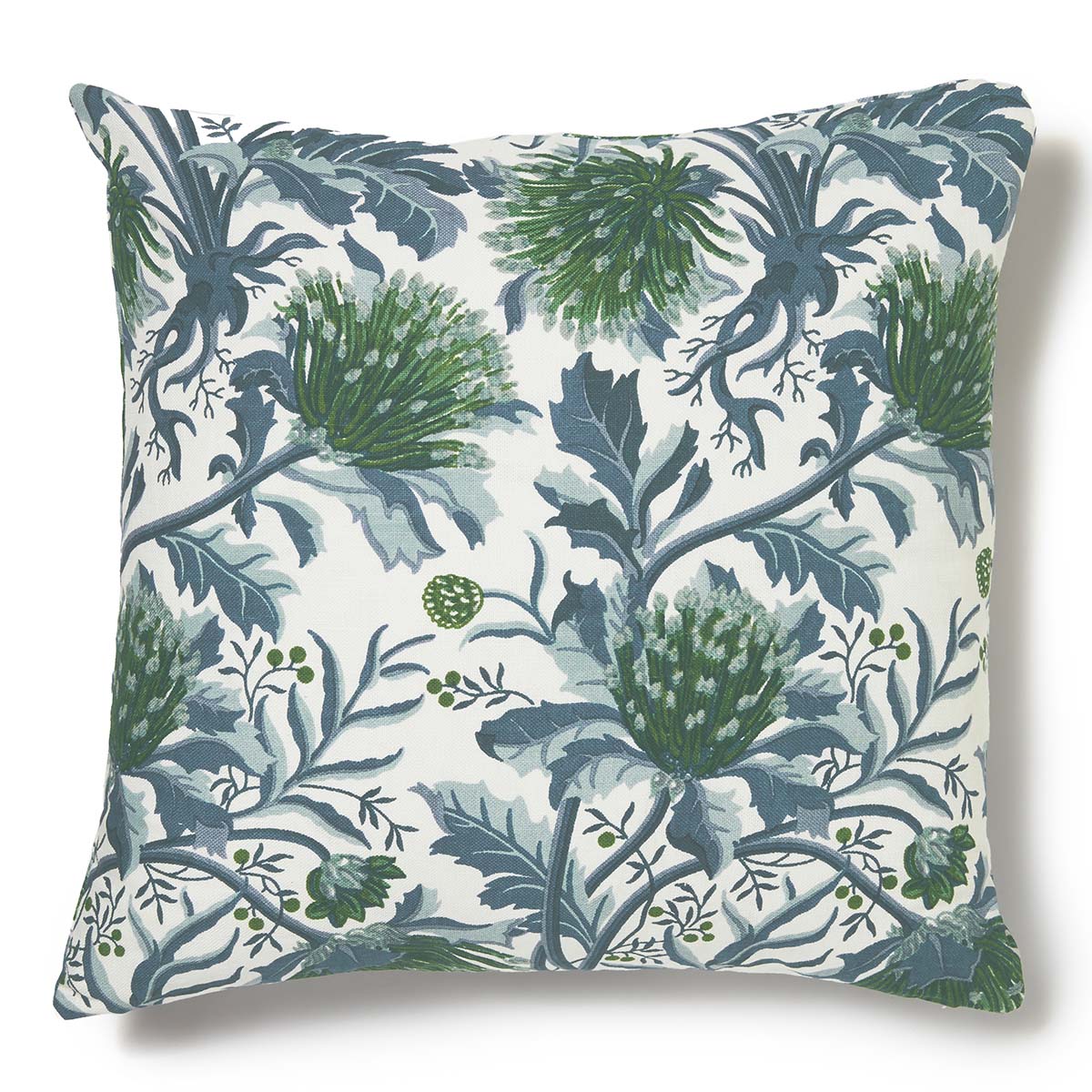 Utopia Goods: decorative throw pillow with botanical pattern featuring green and blue leaves on cream background